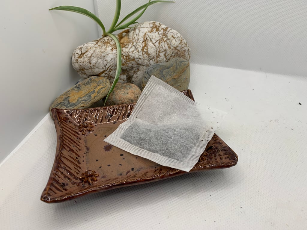 Pretty used  teabag dish