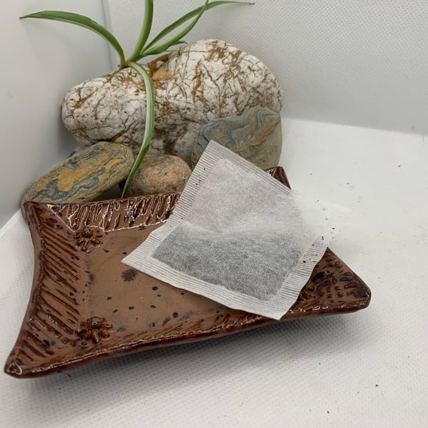 Pretty used  teabag dish