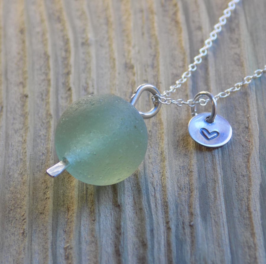 Sea glass marble pendant with tiny heart charm
