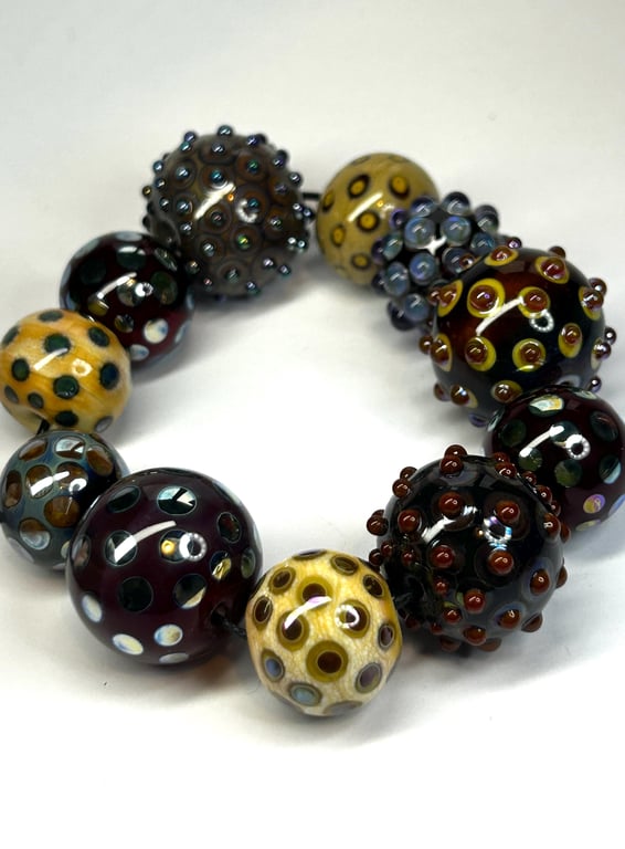 Handmade lamp work glass beads