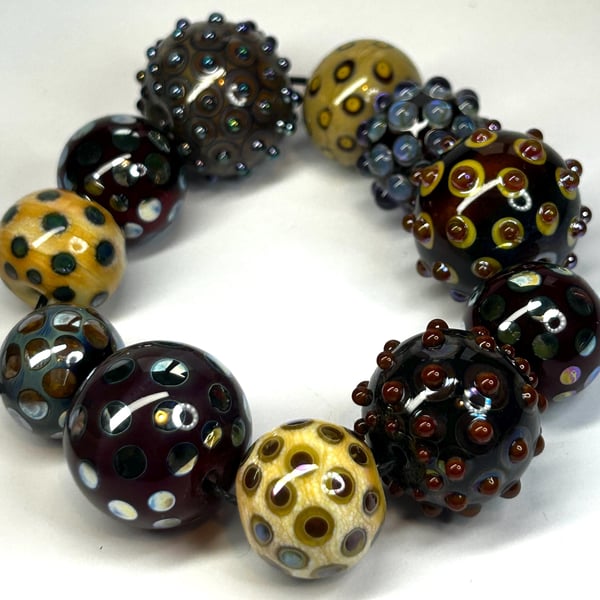 Handmade lamp work glass beads