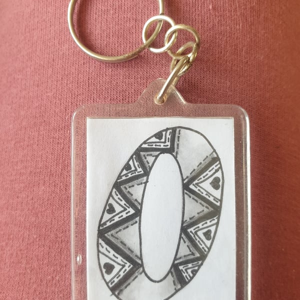 Hand drawn initial "O" keyring.