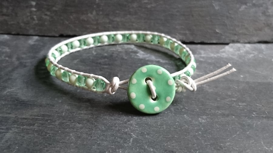 Green glass bead and pearl bracelet, ceramic polka dot button and silver leather