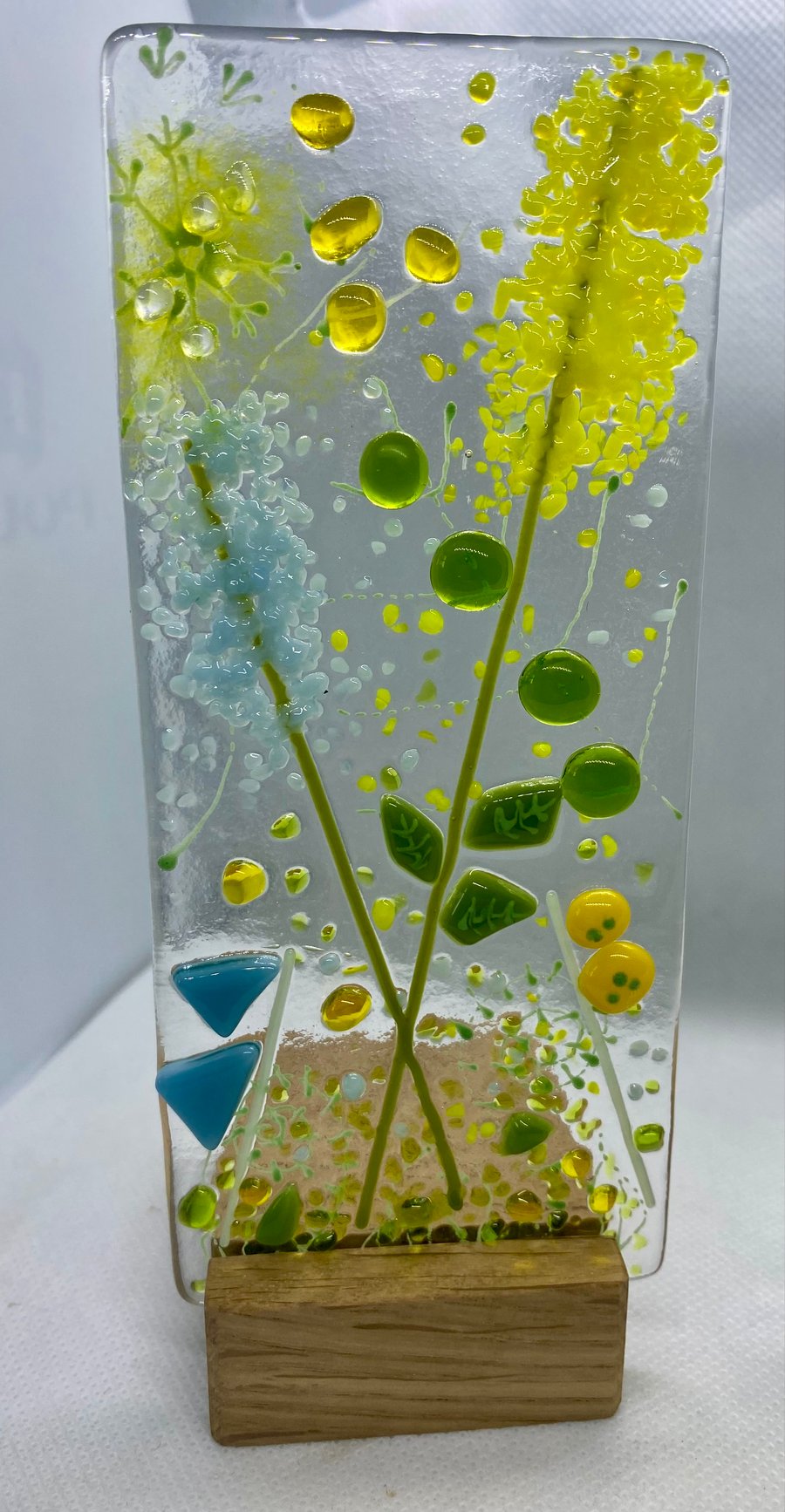 Fused glass hand-painted panel in a solid wood stand