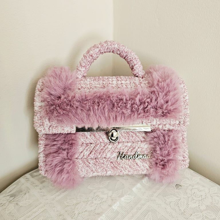 Mini handheld beautifully designed pink fluffy clutch bag