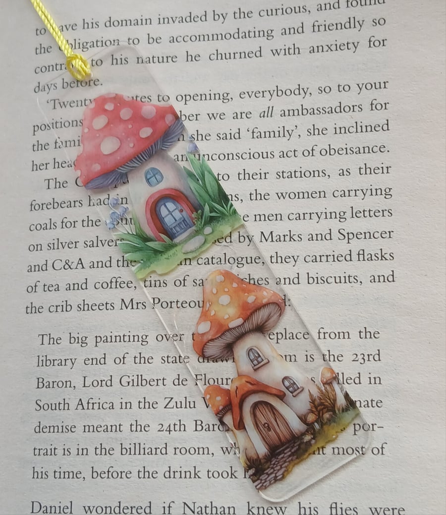 Clear acrylic bookmark decorated with toadstool decals
