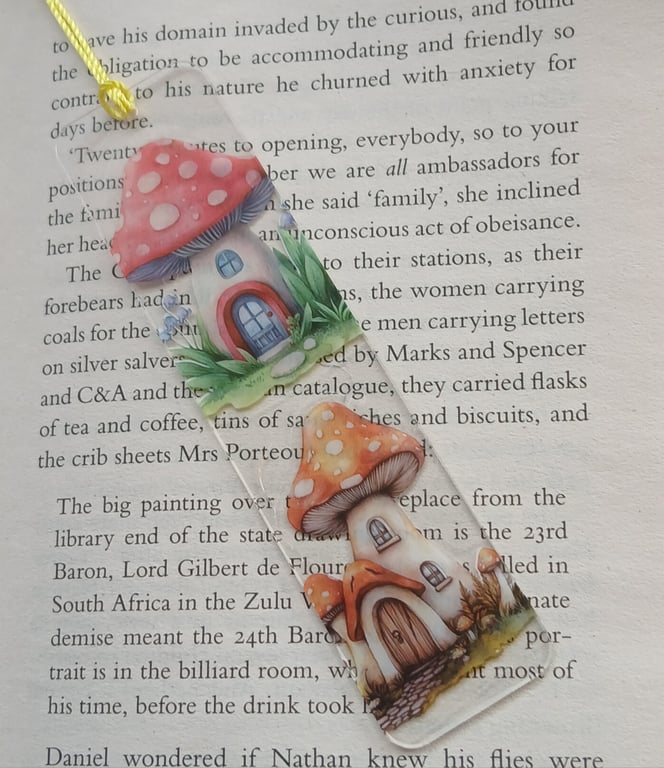 Clear acrylic bookmark decorated with toadstool decals