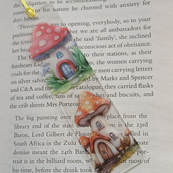 Clear acrylic bookmark decorated with toadstool decals