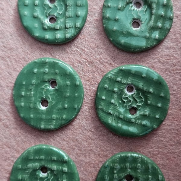 A Set Of Six Green Handmade Buttons