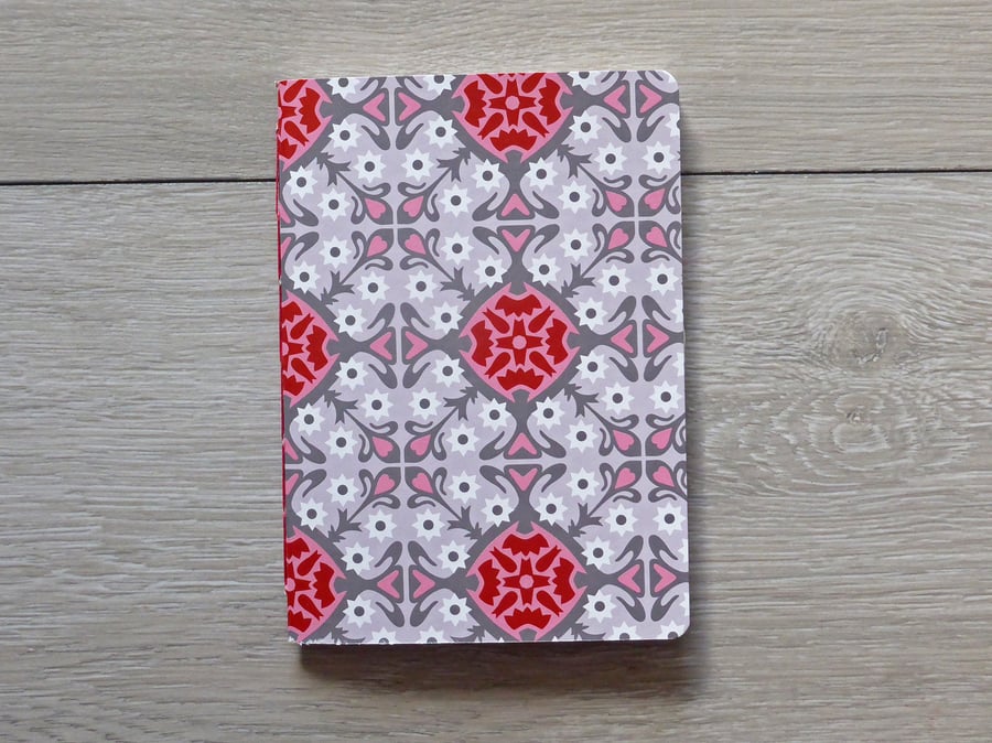 Handmade A6 notebook with geometric pink pattern