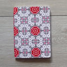 Handmade A6 notebook with geometric pink pattern