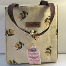 Canvas hand bag in bee print.