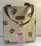 Canvas hand bag in bee print.