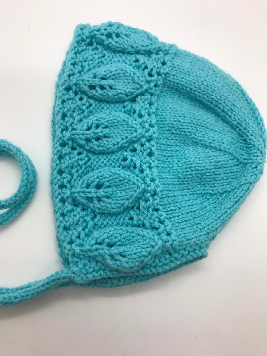Turquoise baby bonnet, hand knitted