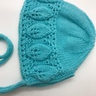 Turquoise baby bonnet, hand knitted