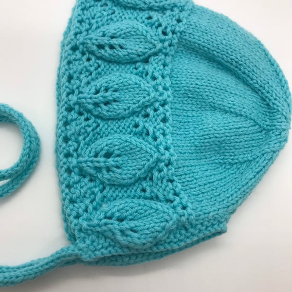 Turquoise baby bonnet, hand knitted