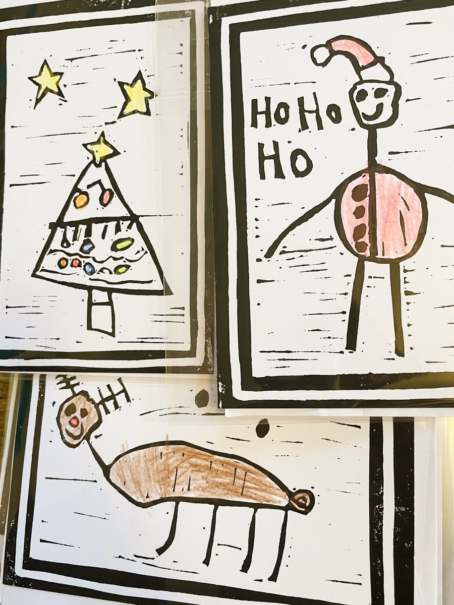 Lino print cards by Eli Age 6. Hand coloured 