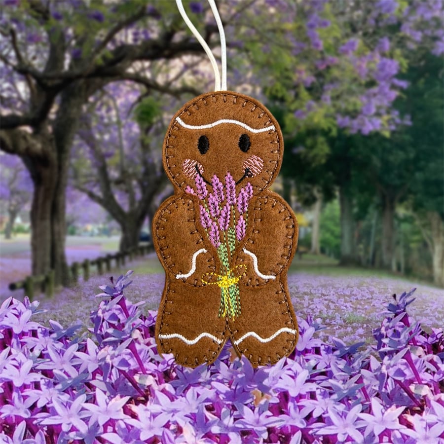 Gingerbread man holding some lavender Embroidered Hanging Keepsake 