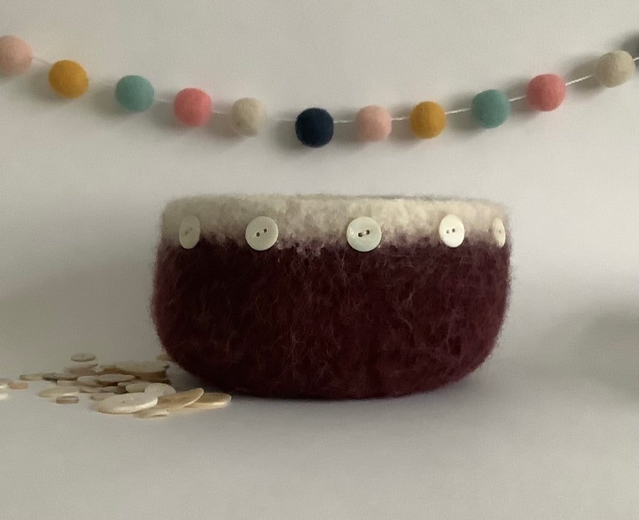 FELTED 'FUSSPOT' BOWL, desk tidy . Maroon, white rim  ( with button detail ) .