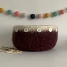FELTED 'FUSSPOT' BOWL, desk tidy . Maroon, white rim  ( with button detail ) .