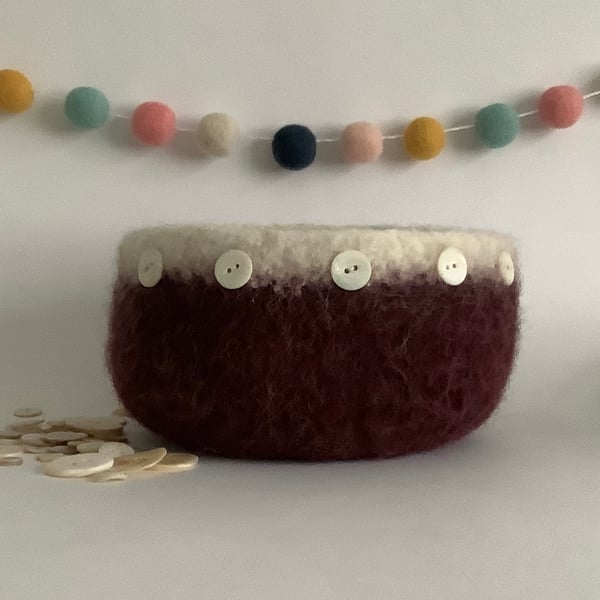 FELTED 'FUSSPOT' BOWL, desk tidy . Maroon, white rim  ( with button detail ) .