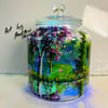 A hand painted and fired glass jar with sealable glass lid by Andrew Jenkins 