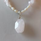 Pendant necklace with rose quartz, pearl and seashells 