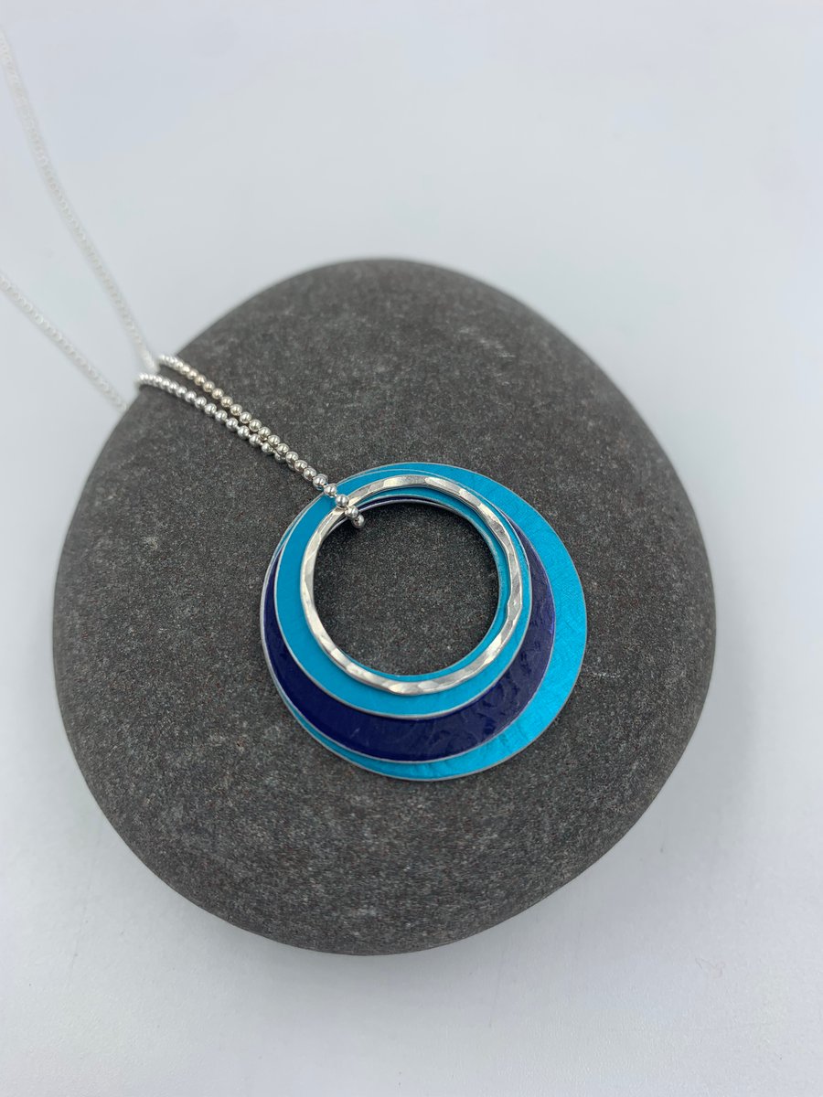 'Ripples' circle pendant in turquoise and navy with recycled silver rings