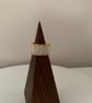 Stylish gold and white pearl colour beaded ring