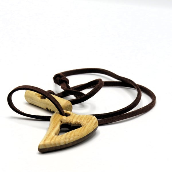 Pierced heart pendant, handcarved from two woods. SKU-N05 