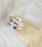 Silver Wide Band Spinner Ring With Topaz - Image 1