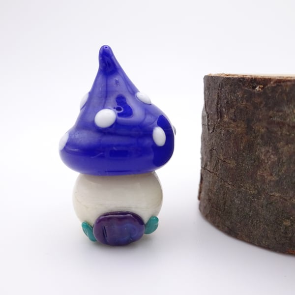 small glass toadstool house