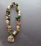 Elasticated moss agate and assorted bead bracelet with silver pumpkin charm  - Image 3