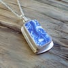 Worn pottery pendant set in sterling silver bezel 