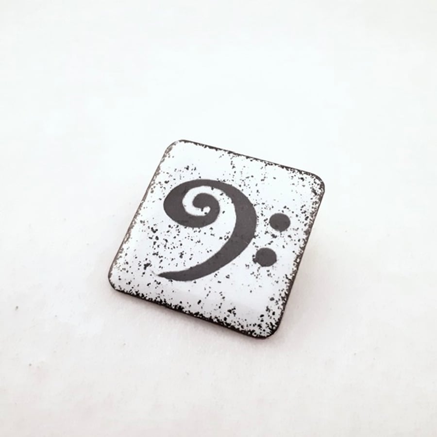 Bass Clef Brooch - a Small Square Brooch in Black and White Enamels