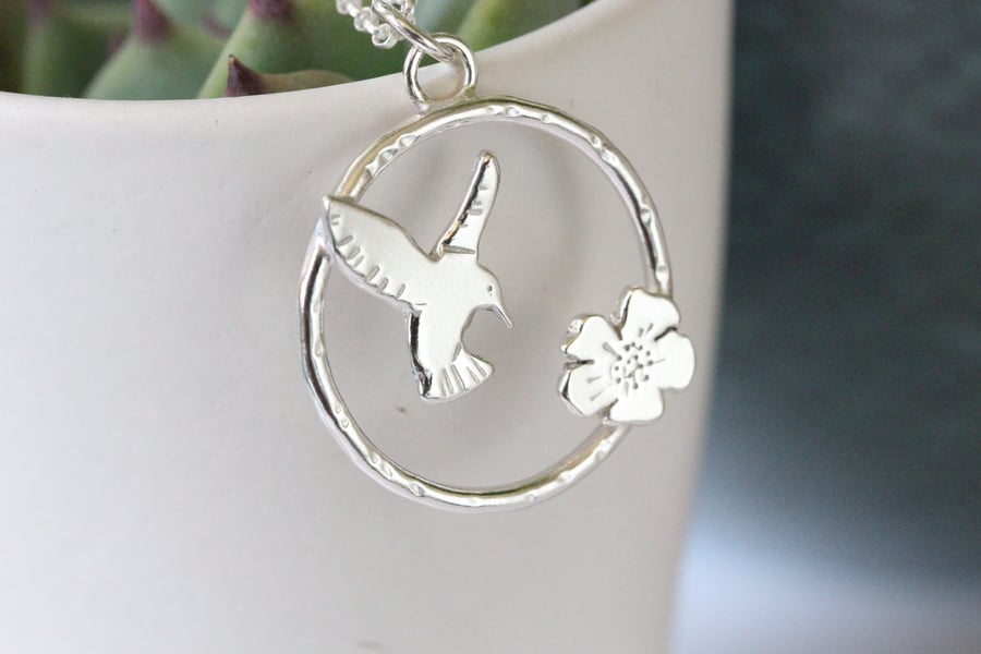 Humming bird and flower sterling silver necklace