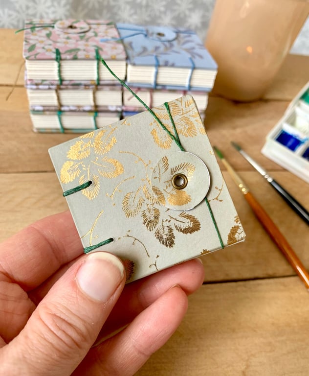 Coptic Bound Tiny Floral Watercolour Sketchbook. Green and gold.