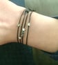 Four Black Leather with Tiny Silver Stars Stacking Friendship Bracelets,  - Image 1