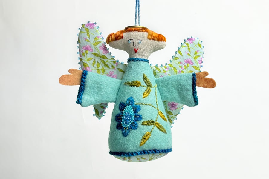 Blue felt hanging angel with hand embroidered marigold