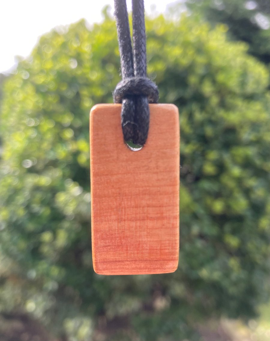 Alder and sapele reversible wooden pendant 