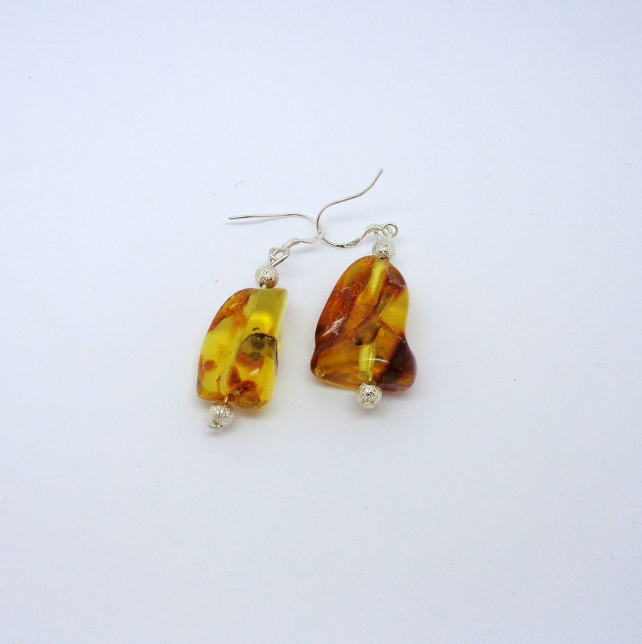 Amber drop earrings with sterling silver beads