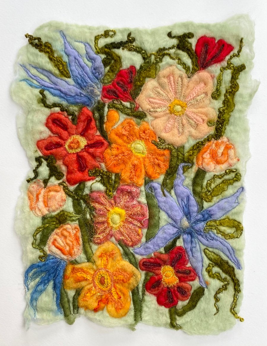 Embroidered flower wet felting fibre wall art. 