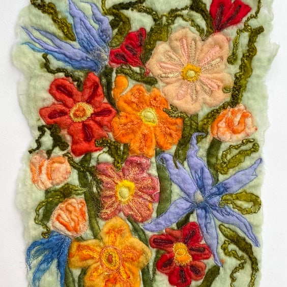 Embroidered flower wet felting fibre wall art. 