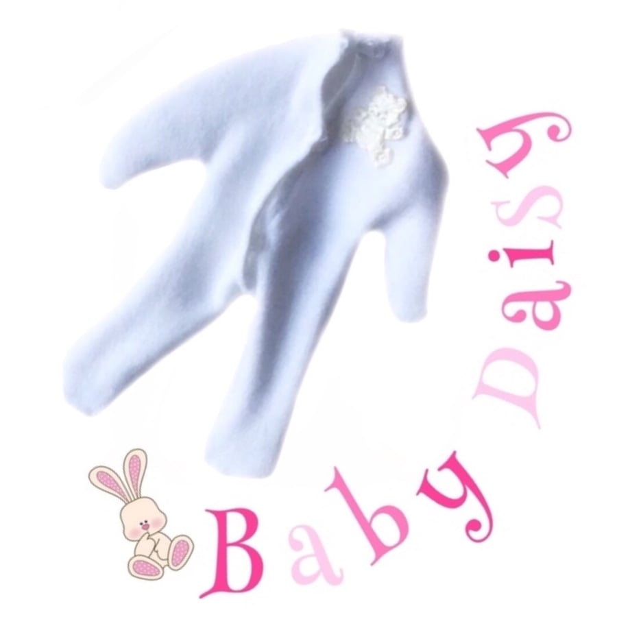 White sleepsuit for baby Daisy
