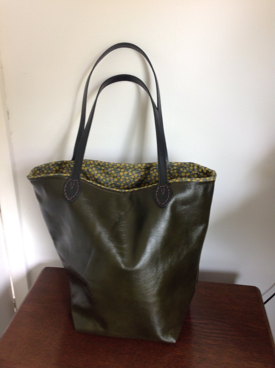 Tote olive green leather bag.