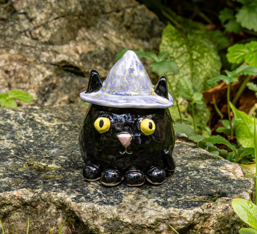Black ceramic witch cat ornament
