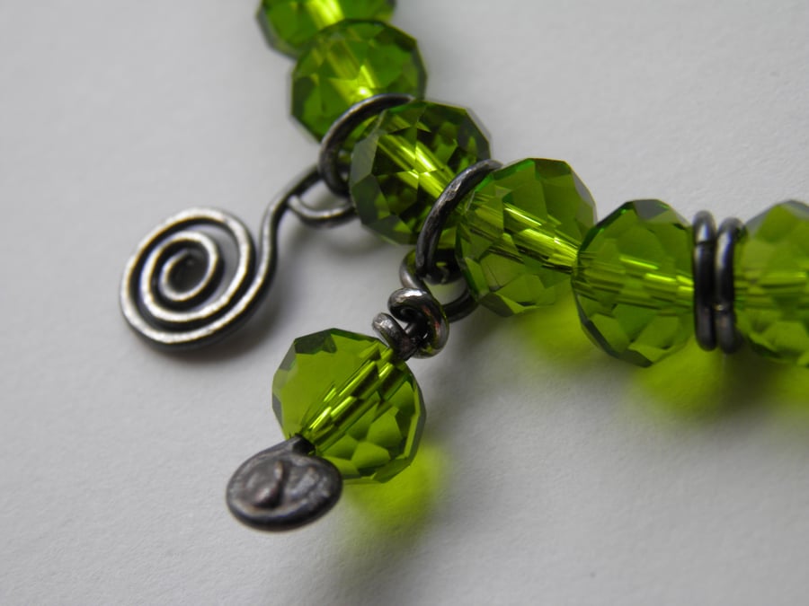 Green Bracelet with Oxidised Silver Spiral Charm