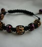 GOLD, RAINBOW IRIS AND BLACK MACRAME BRACELET. - Image 2