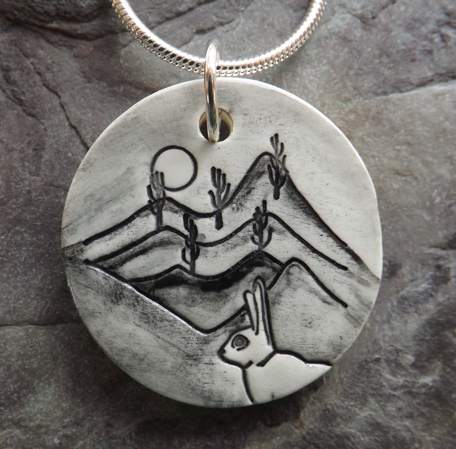 Handmade Ceramic Hare pendant in black white and grey