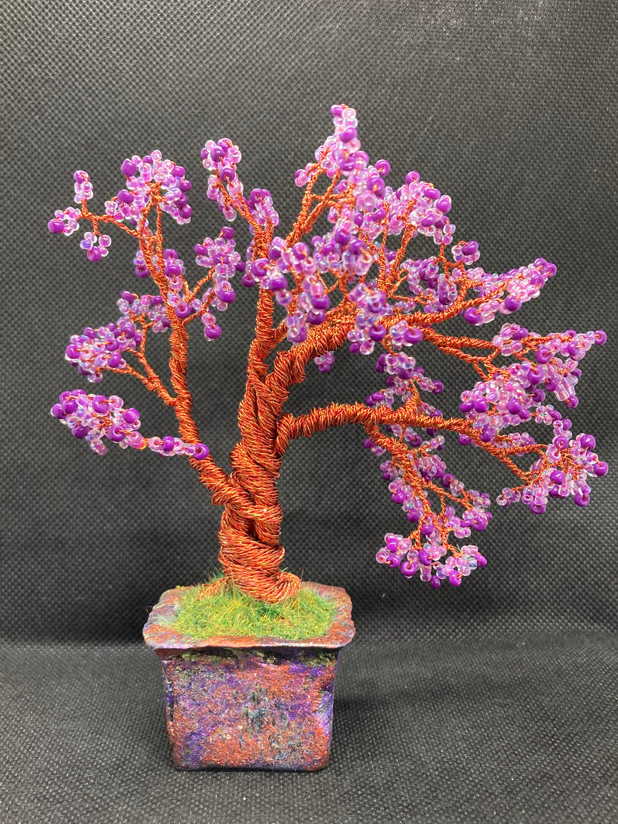 Wire tree sculpture with handmade pot